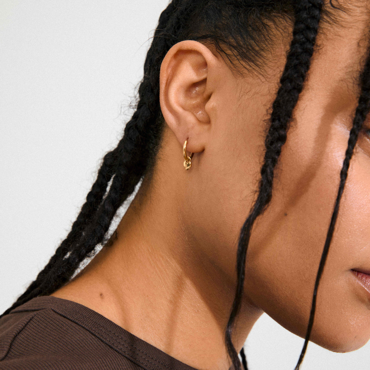 ALAIA recycled tiny heart pendant earrings
