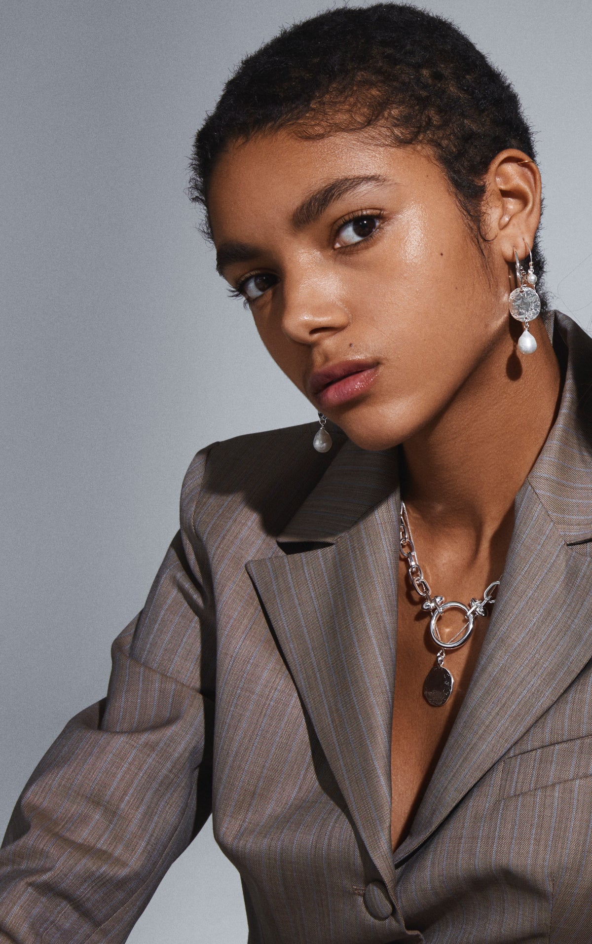 model wearing Pilgrim Jewellery  Affection Necklace and Affection Coin Necklace 
