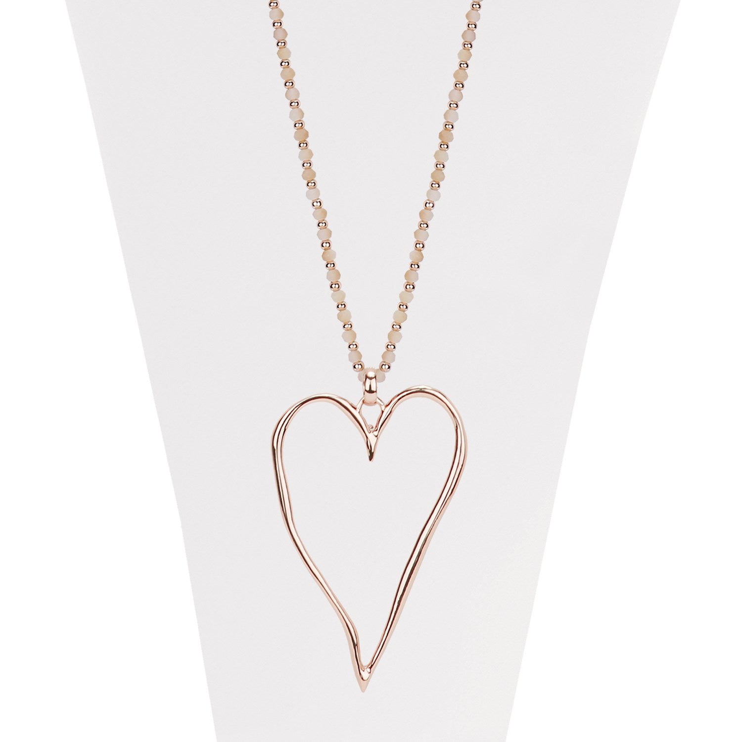 Nude and rose gold necklace with faceted beads and large wavy heart pendant 