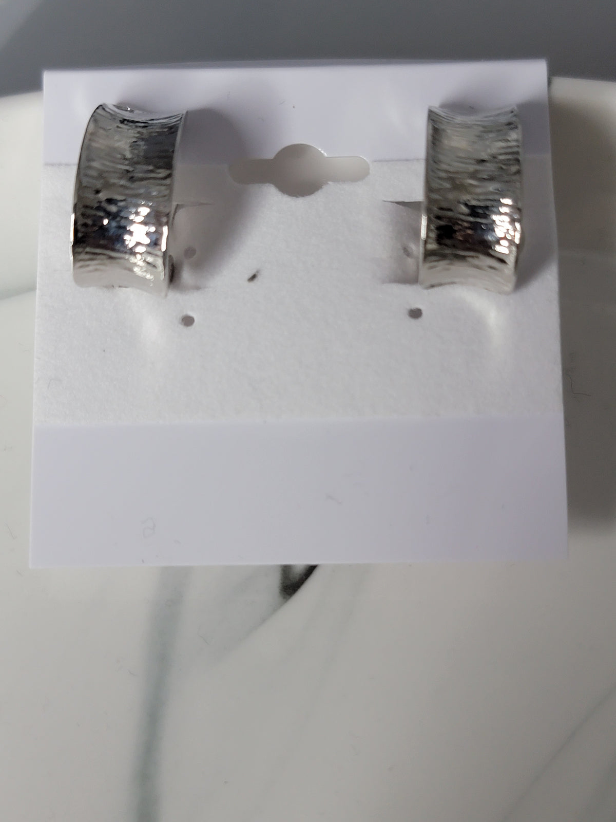 shiny silver clip fashion earrings