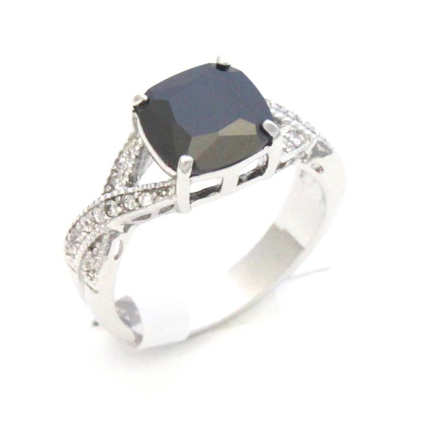 CZ Fashion Ring with black and clear cubic zirconia.  Brass and Rhodium plated  Size 7