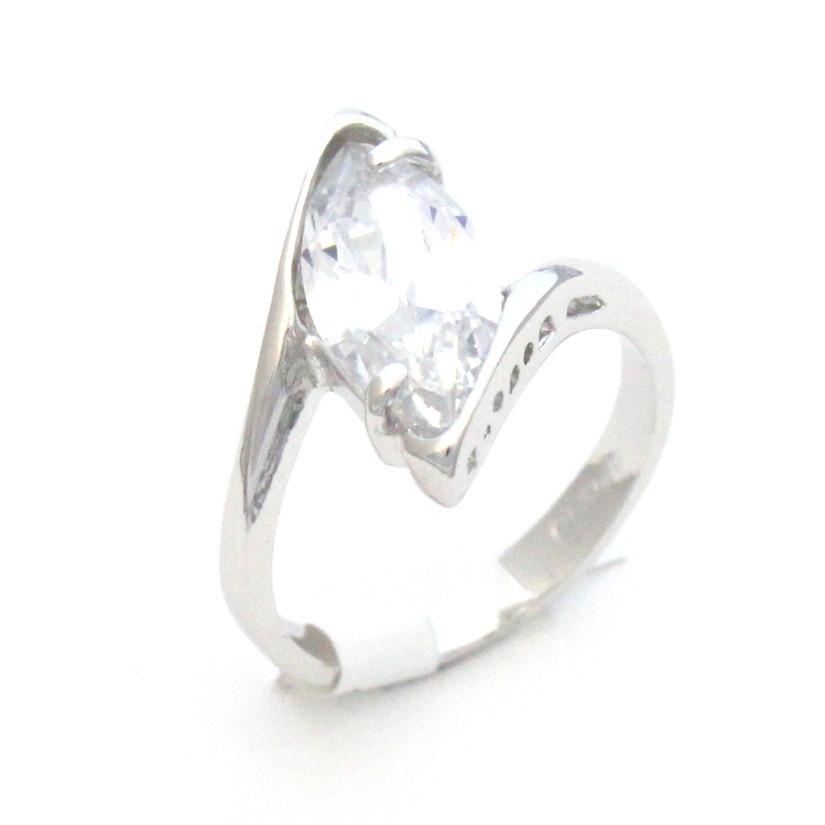 Fashion Ring with clear cubic zirconia. Brass and Rhodium plated. Size 7