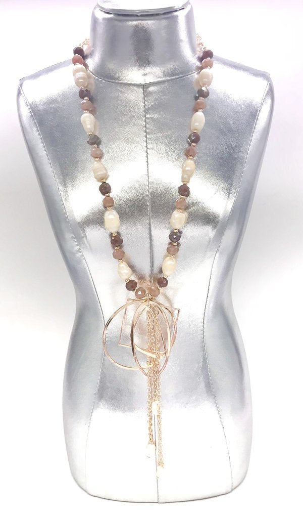 Beaded fashion  jewellery necklace that dangles on a rose gold chain 