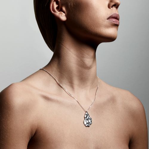 model wearing pilgrim jewellery silver compassion necklace 